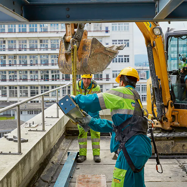 Workmen crush Building 316.