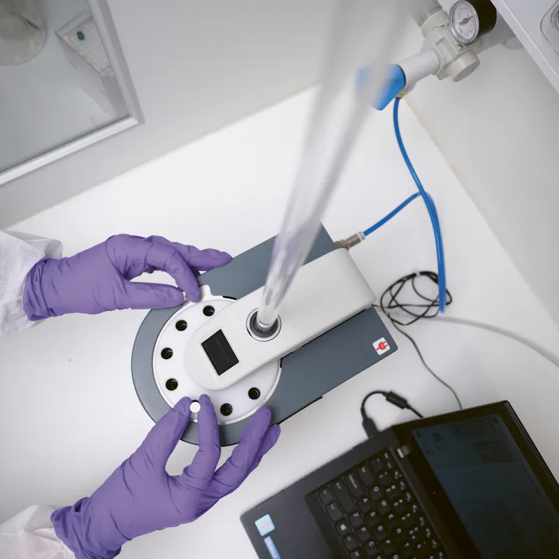 Step 3: After dropping the vials into the sender, the air-compressed tubes transport the vials to the corresponding analytical machinery. Scientists can return to other experiments in the lab. 