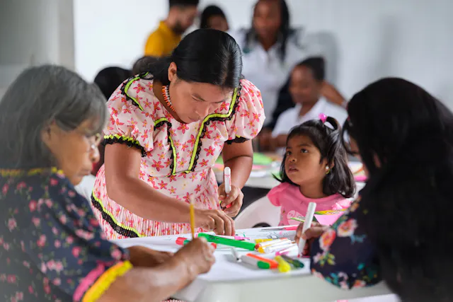 A group of women from an indigenous community at a health workshop near Santa Cecilia, Colombia. Designed to establish relationships with otherwise isolated populations, the workshops provide information on infectious disease prevention, diagnosis and treatment.