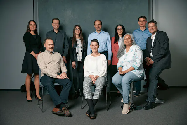 Thomas Holbro's leadership team (from left to right, standing): Johanna Heinzerling, Philippe Ferber, Olympia Papachristofi, Thomas Holbro, Nancy Zaour, Philipp Lustenberger. Seated: Nicolas Rouyrre, Marion Dahlke, Severina Jacinto-Sanders, Matthias Meier.