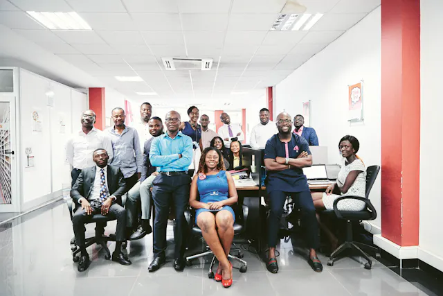 The teams from Sandoz and Novartis in Ghana in an office.