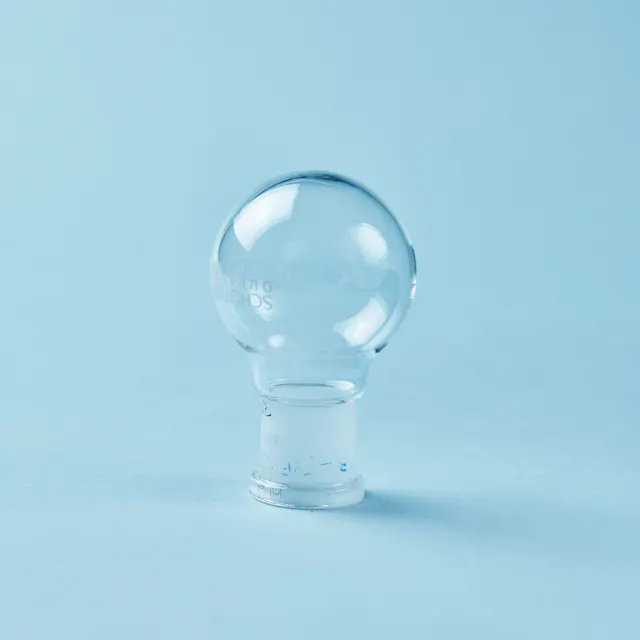 A traditional round bottom flask compared with...