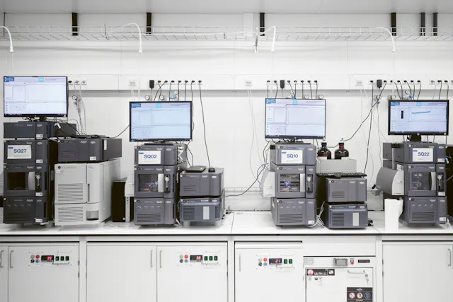 Early-stage drug discovery starts with creating new chemical substances in a lab environment. The next step includes characterizing the substance in terms of purity, molecular weight and structure – each of which requires a sample of the substances to be run through a separate analytical tool. These measurements are crucial for understanding the potential of the substance. Before Lab2Lab, scientists had to manually carry a sample to each of the separate machines and record the data themselves. Lab2Lab allows scientists to scan and insert a bar-coded vial containing a single sample into a sender and then let automation take over.