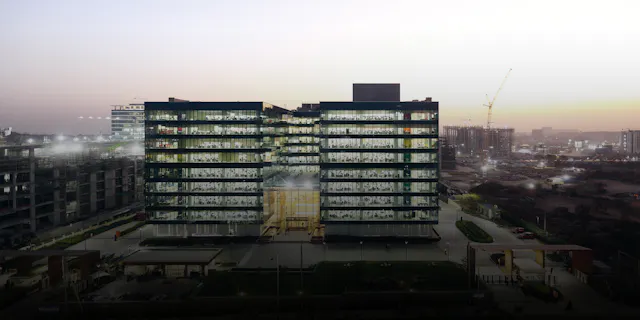A rainbow-colored crystal during the night. The Novartis Knowledge City in Hyderabad.