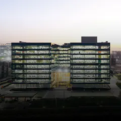 A rainbow-colored crystal during the night. The Novartis Knowledge City in Hyderabad.