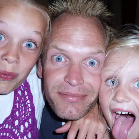 Marc Rijken and his daughters with their bright blue eyes
