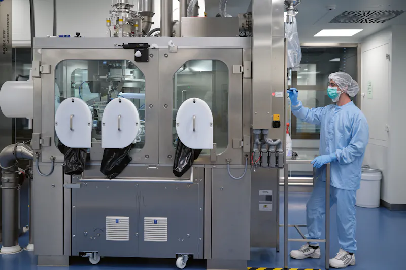 Scientist operates machine
