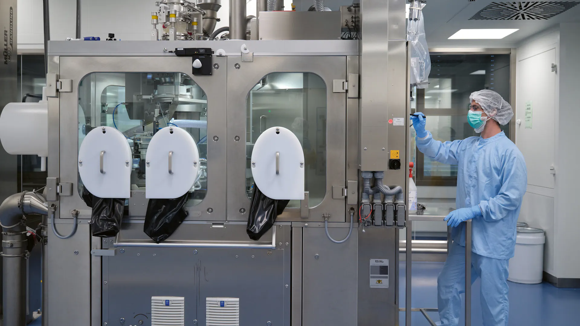 Scientist operates machine