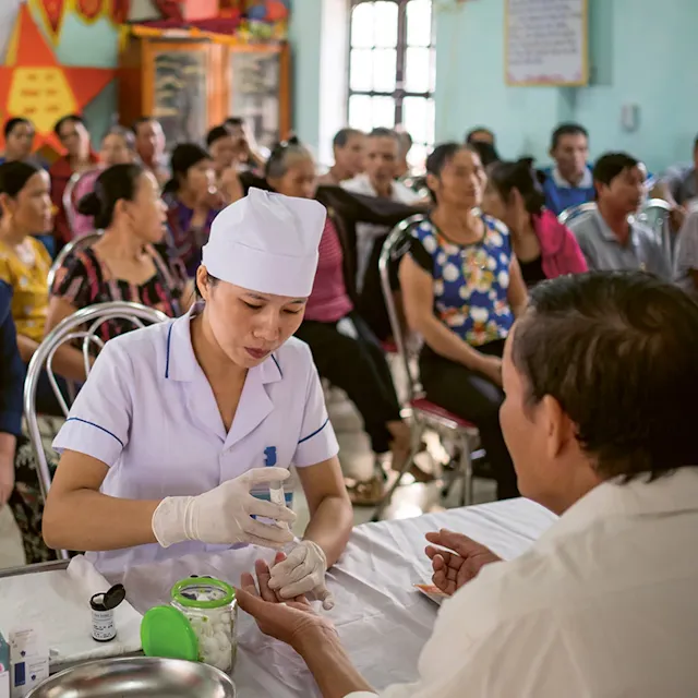 A nurse is providing essential healthcare services for the rural population – her service is valuable as it saves patients’ time by avoiding long travels to the city.