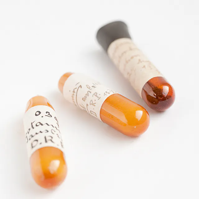 Original ampoules from the 1920s with ergotamine, one of the oldest pharmacological substances still available in the company; labeled by Sandoz researcher Arthur Stoll.