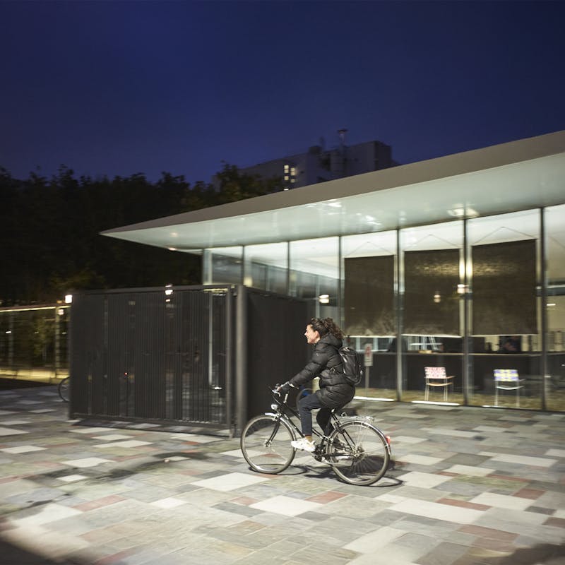 Nelly Riggenbach riding her bike on the Novartis Campus.