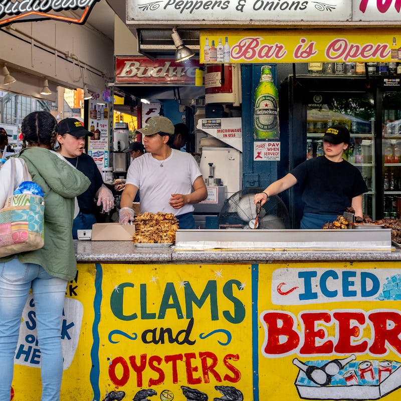 Busy fast food stand on a New York City street.