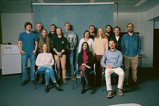 FMI Luethi team (from left to right): Mathias Mahn, Andreas Luethi, Kitti Rusznak, Nigel Whittle, David Ruel, Julian Hinz, Sigrid Mueller, Martin Zeller, Iris Odstrcil, Nikolas Karalis, Tobias Eichlisberger, Nikos Armeniakos. Seated: Sivan Kanner, Maria Sol Fustiñana, Andras Szoenyi.