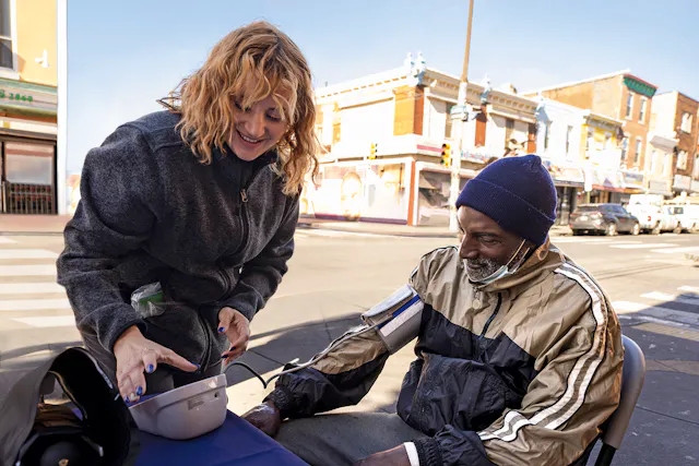 Maggie Perez checks the blood pressure of a local resident in Philadelphia. Approximately 40% of Philadelphia residents are Black or African American, according to research by the Pew Charitable Trusts. Risk factors behind cardiovascular disease are exacerbated by racial inequality, which can be defined as the unequal distribution of resources, power, and economic opportunity across race. According to the American Heart Association, heart disease accounts for nearly 40% of the disparity in life expectancy between Black and white Americans.