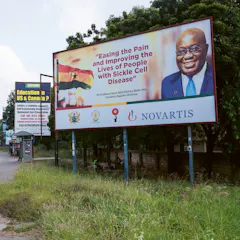 Novartis poster on a street in Ghana.