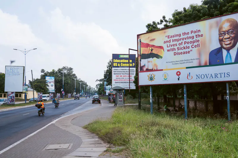 Novartis poster on a street in Ghana.