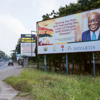 Novartis poster on a street in Ghana.