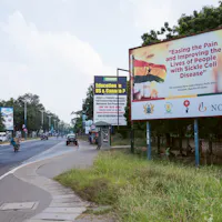 Novartis poster on a street in Ghana.