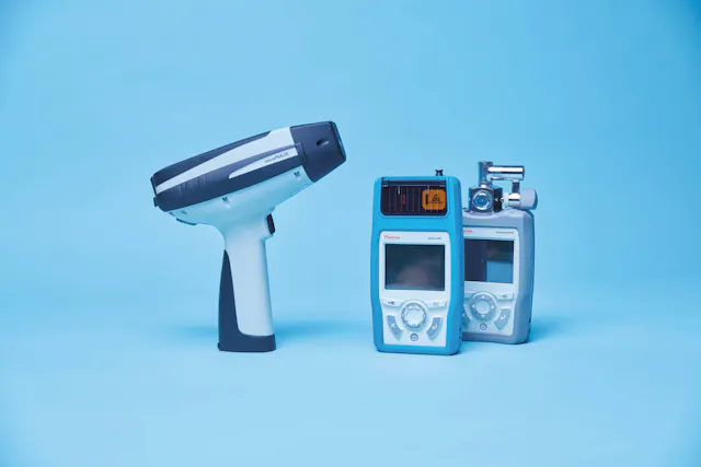 Digital detectors in front of light blue background.
