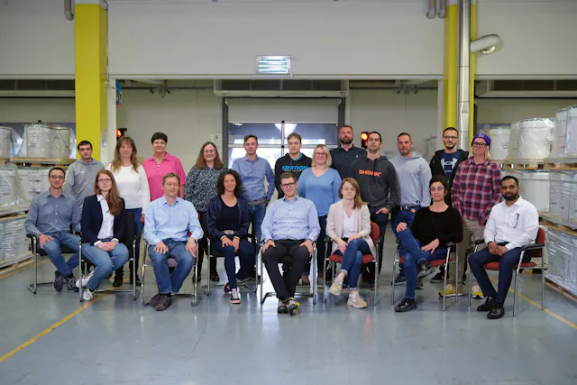 The Wehr Team (from left to right, standing): Rick Zettler, Petra Distel, Silke Kappler, Sabina Ganter, Massimo Moratto, Marc Wohler, Andrea Klingele-Sturm, Martin Vaessin, Giuseppe Ingui, Moritz Burget, Michael Sehil, Daniela Wischnewski. Seated: Martin Schaefer, Britta Luechtenborg, Stefan Steigmiller, Sabine Herzog, Stephan Stocker, Irene Friesen, Peggy Quinton, Shamshuddin Qureshi.