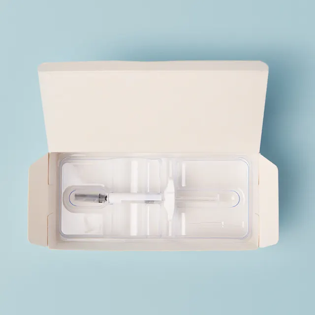 Getting rid of plastic in secondary packaging. Instead of using PVC to hold the syringe in the primary packaging, engineers designed a stable carton inlay.