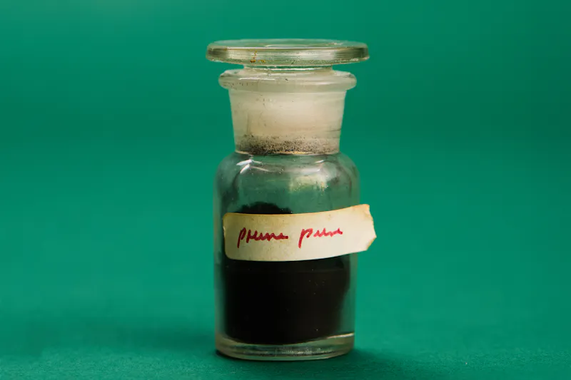 Old flask with "pure prune".