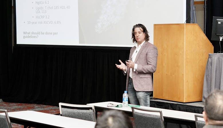 Joel Gelfand gives a presentation at SID 2022