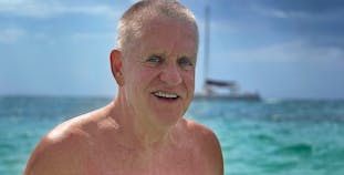 Pat Corbin smiles while enjoying a day on the water.
