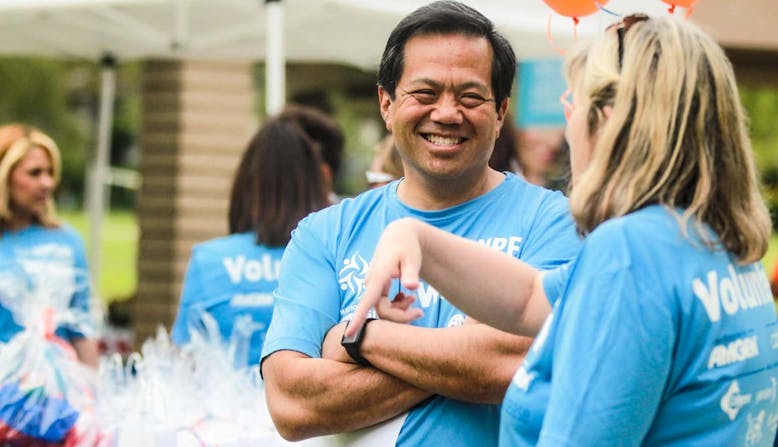 NPF volunteers interact during an event outside. 