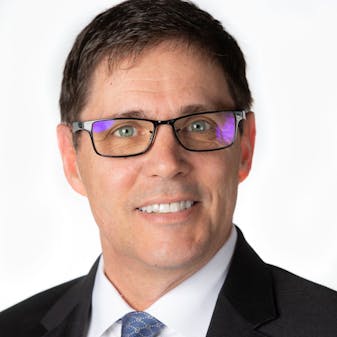 Headshot of Ron Grau.