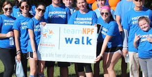 A group poses during a Team NPF Walk charity event. 