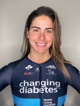 Professional cyclist Mandy Marquardt of team Novo Nordisk, who has psoriasis, smiles in her 'changing diabetes' kit.