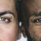 Up close photo of two men's faces side by side.