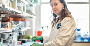 Researcher Charlotte Hurabielle-Claverie, M.D, works in a lab where she researches psoriatic disease.