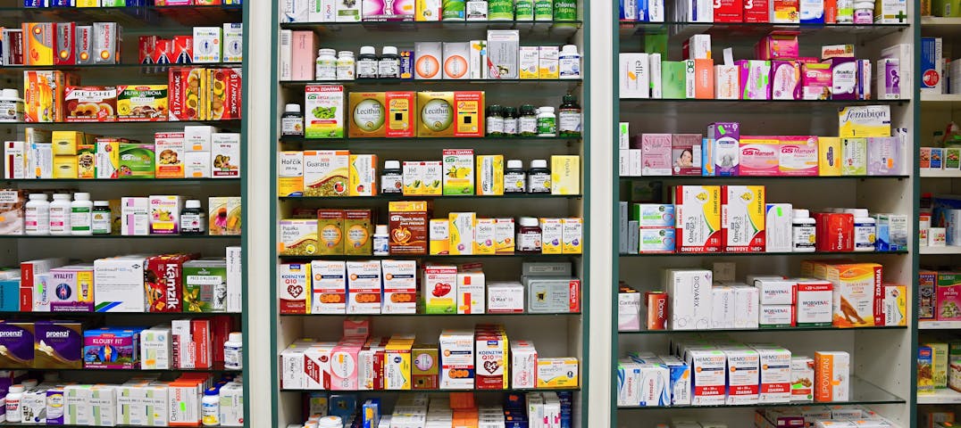Store shelves filled with over-the-counter medication.