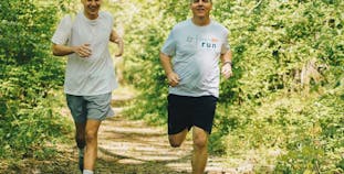 Derek and Issac Schujahn run together outside for Team NPF. 