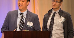 Wilson Liao, M.D. (left), and Johann Gudjonsson, M.D., Ph.D., present at NPF Cure Symposium.