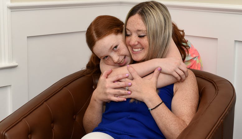 Michel and Leah Tarabocchia embracing.