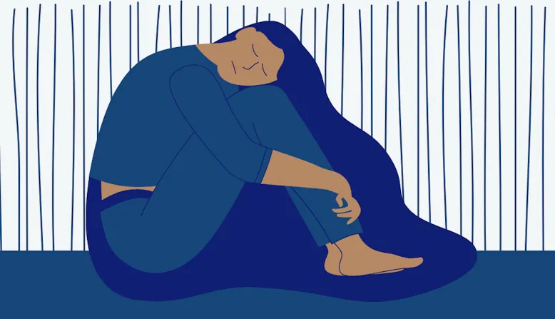 Illustration of woman sitting holding her knees looking sad.