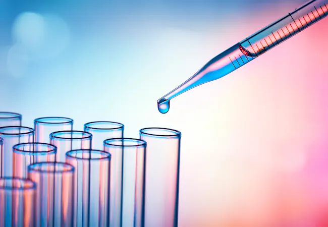 A pipette with liquid over test tubes. Cure concept.