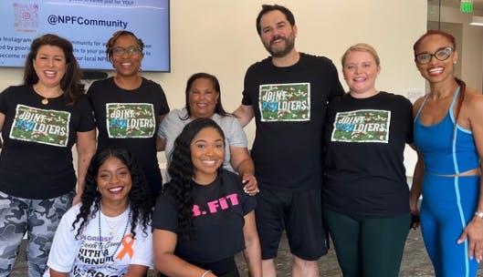 A group of people at a Take ACTION for Psoriatic Disease event.