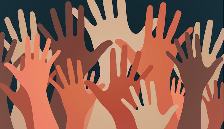 Hands of many colors of skin reaching upward.