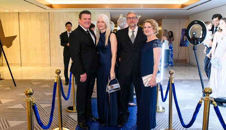 Attendees at the 2024 Commit to Cure Gala smile and pose.