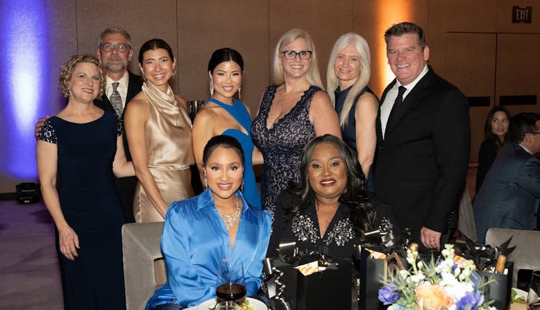 Attendees at the 2024 Commit to Cure Gala smile and pose.