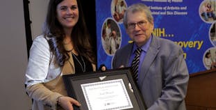 Stephen Katz receiving an award from NPF.