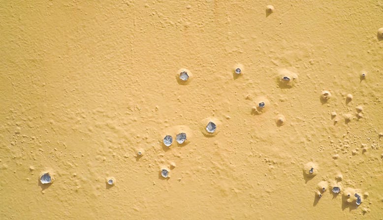 Paint bubbles and peeling. Generalized Pustular Psoriasis concept.