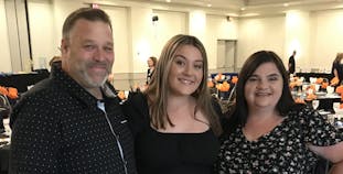 Karlee and her parents at an NPF event.