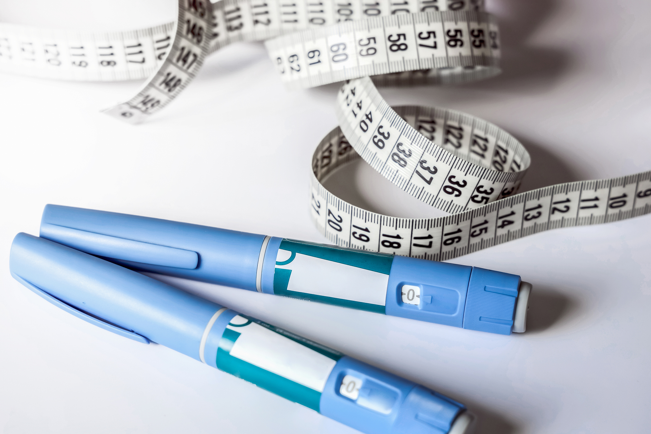 Weight loss medication injectors with a tape measure.
