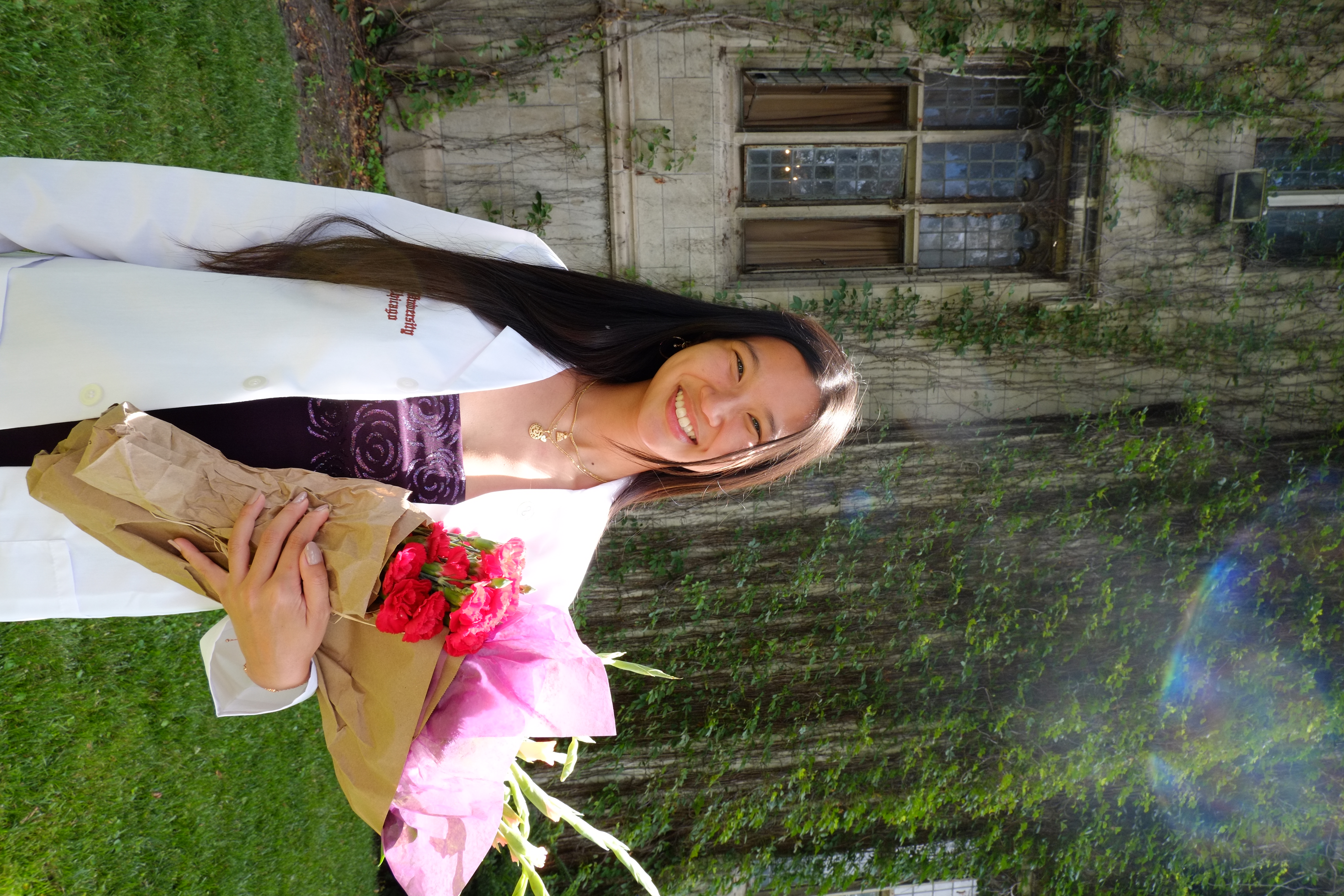 Dayna Pham in her white coat.