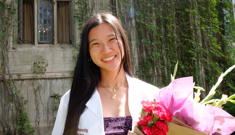 Dayna Pham in her white coat.
